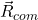 \vec{R}_{com}