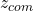 z_{com}